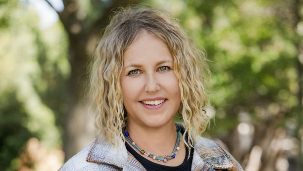 Dr. Fransson outside on a fall day.