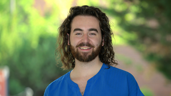 Zachary outside the Veterinary Teaching Hospital on a nice summer day.