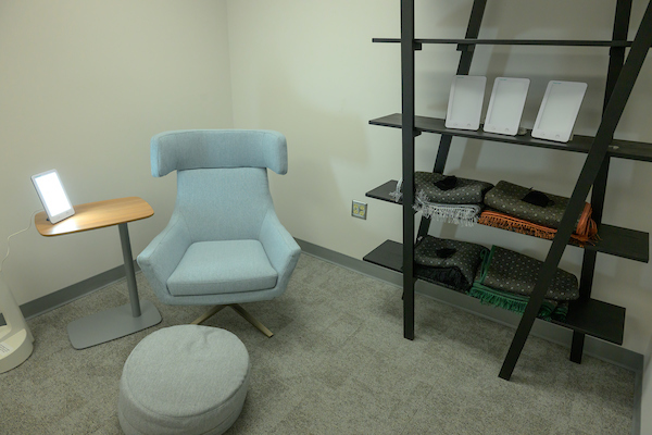 Chair and ottoman with book shelf