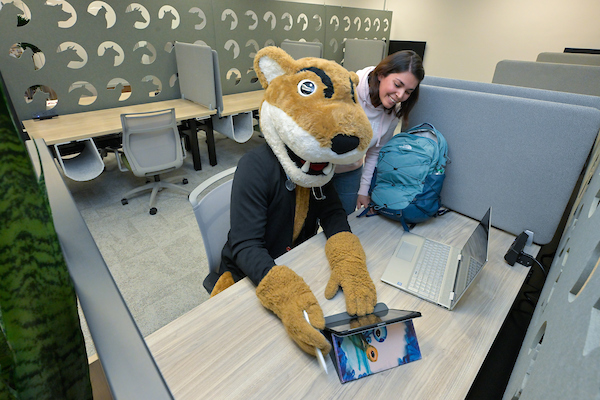 Butch at a desk in the student success center
