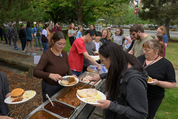 People in the food line.
