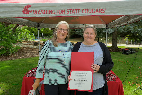 Chanelle receiving her award from Dean Dori.
