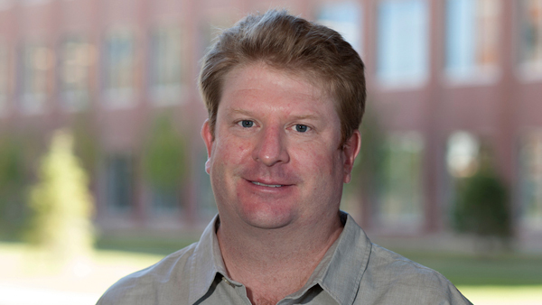 Dr. Tanneer outside the college.