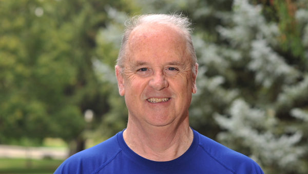 Dr. Rick DeBowes outside Bustad Hall.