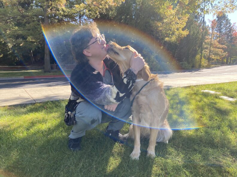 Riley Maher with a dog.