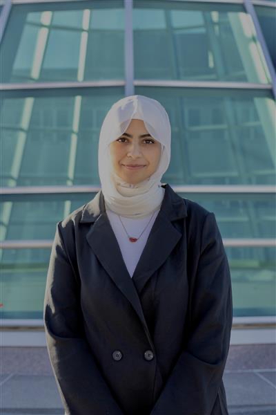 Malik Bensaud in front of the dome over Holland Library.