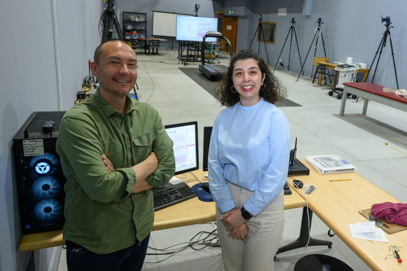 Zahra Abedzadehzavareh, right, poses for a photo with Robert Catena, left, director of the MOM lab.