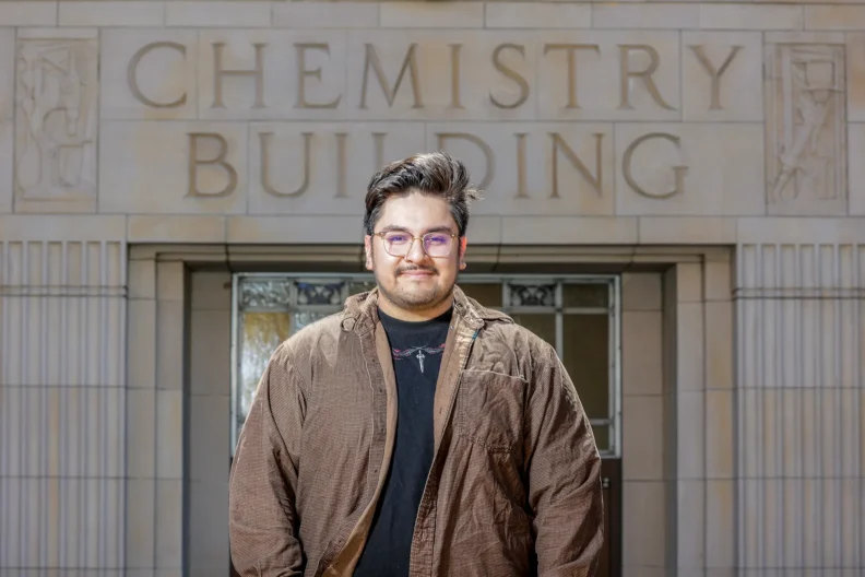 Jo standing in front of Fulmer Hall on the WSU campus.
