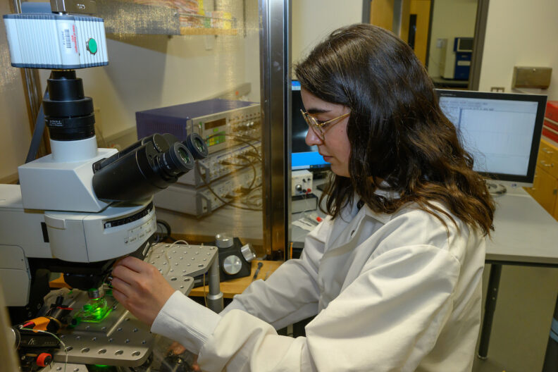 Jo Jara works in the lab.