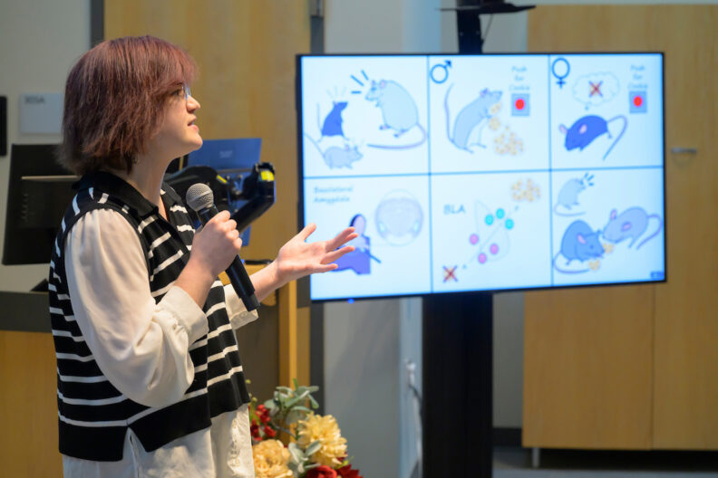 Megan McGraw presents a poster.