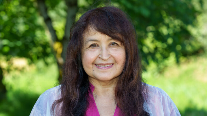 JeanMarie outside on a sunny day.