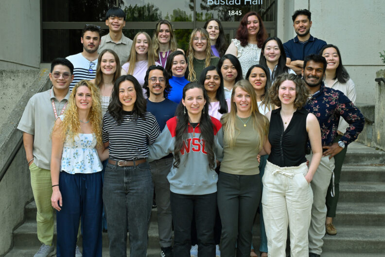 Group of 23 Veterinary Teaching Hospital residents and interns on the main stairs at the entrance of Bustad Hall.