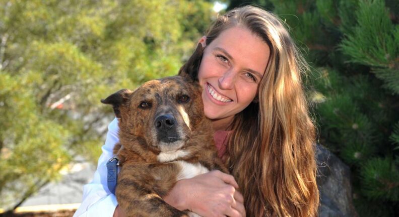 Marjorie with her dog.