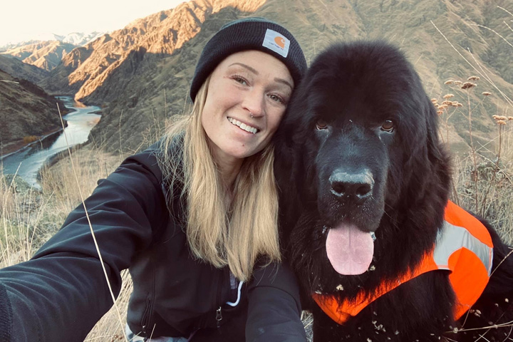 Sarah Huston and her dog Larry during a hike.