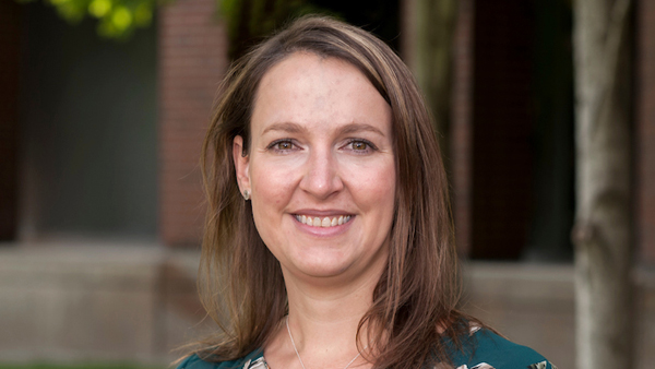 Laura William outside on a sunny day.