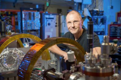 Dr. Marc Weber with the positron beamline.