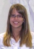 Kelly Fitzgerald wearing a white shirt.