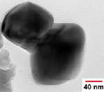 A MoO2 catalyst suspended in a fluidic environment.
