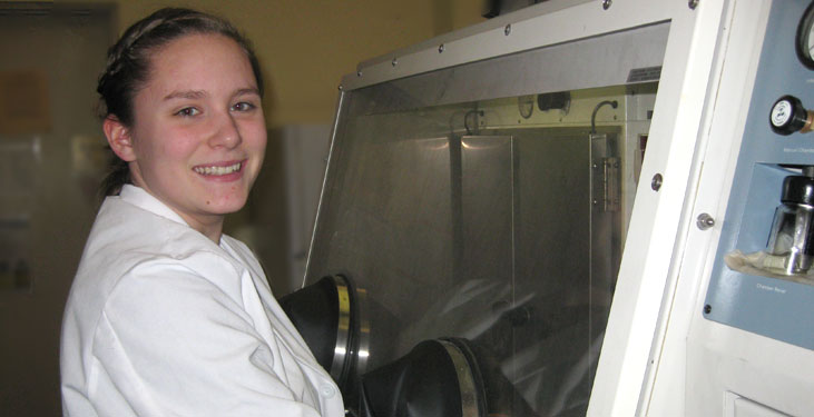 Sarah Zeutschel using scientific equipment.