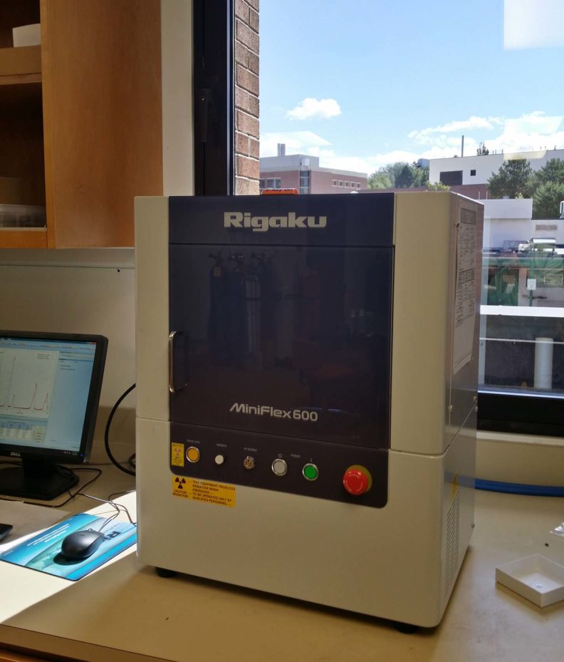 Small machine sitting on a countertop.