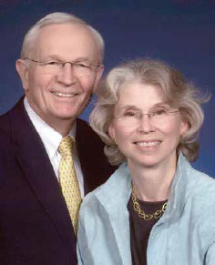 Two people posing for portrait.