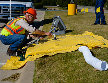 man using methane measuring equipment.