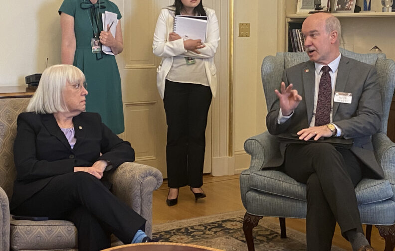WSU Spokane Chancellor Daryll DeWald speaking with U.S. Senator Patty Murray