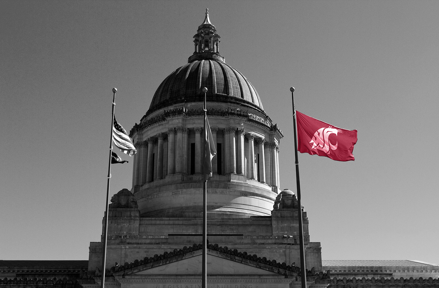 Crimson Coug flag waving over the Olympia Capitol Dome