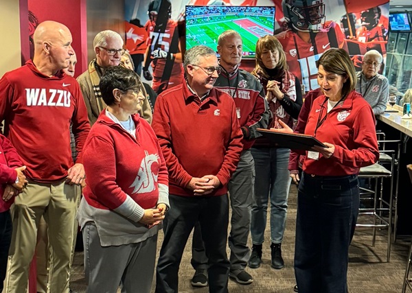 Rep. Cathy McMorris Rodgers delivers speech to a crowd wearing Coug gear