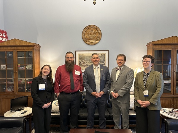 Senator Michael Baumgartner (center) poses with WSU Staff (left to right): Sarah Stewart, Nick Pappin, Kevin Zobrist and Quinn Merrick. 