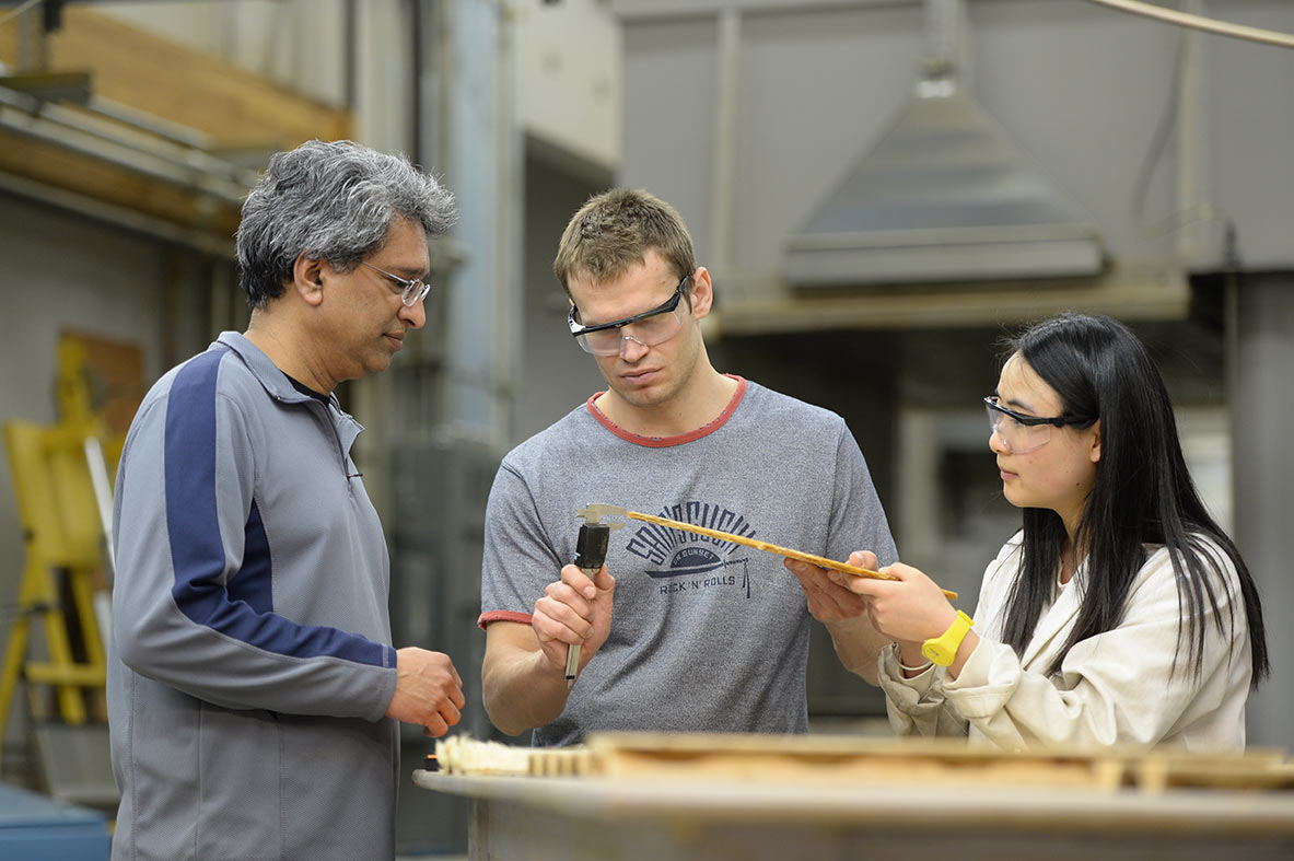 Vik Yadama and students test composite panels