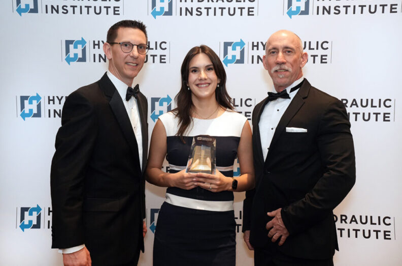 Shelby Ruiz receives the Hydraulics Institute Award from, left, Chairman Scott Tysad and Matthew Derner with the Hydraulics Institute.