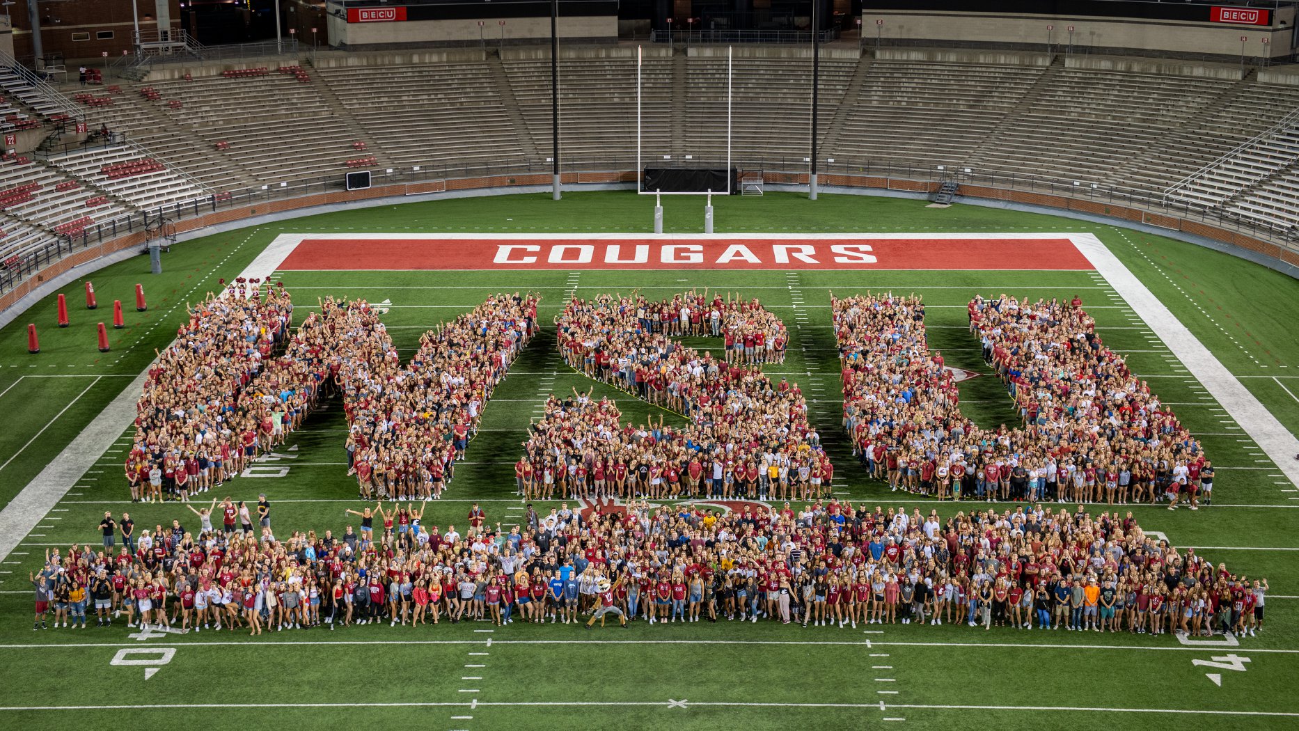 Students spell out WSU on GESA Field