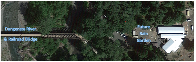Aerial photo of the newly constructed River Center, Dungeness River and Railroad Bridge with location of future rain garden marked.