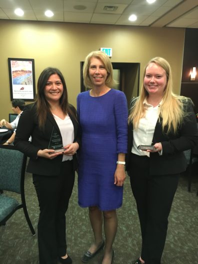 Engage student team with advisor Marie Mayes after winning WSU Business Plan Competition
