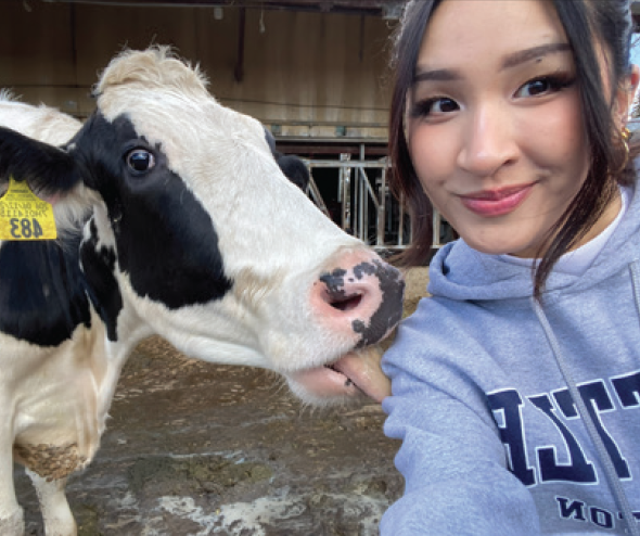 Jadey Ong with cow
