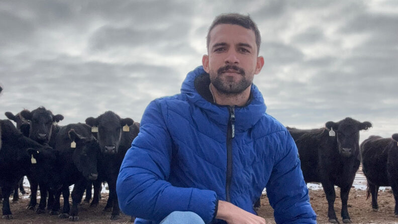 Luan Moura with cattle
