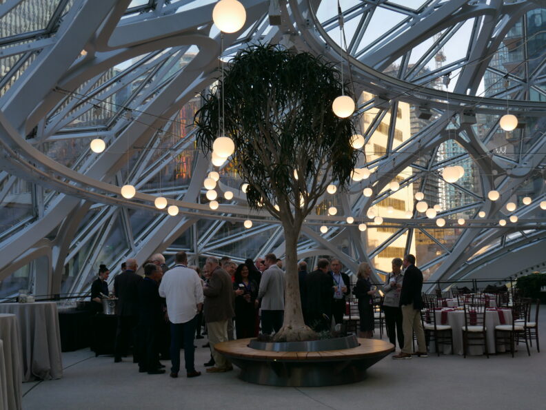 An image of a group of people inside the Amazon Spheres.
