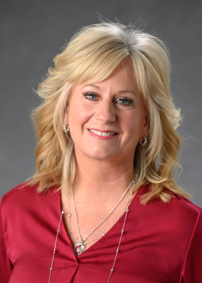 A portrait of Marty Dickinson