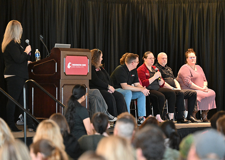 Staff, family, and supporters answer questions as part of the family panel at orientation.
