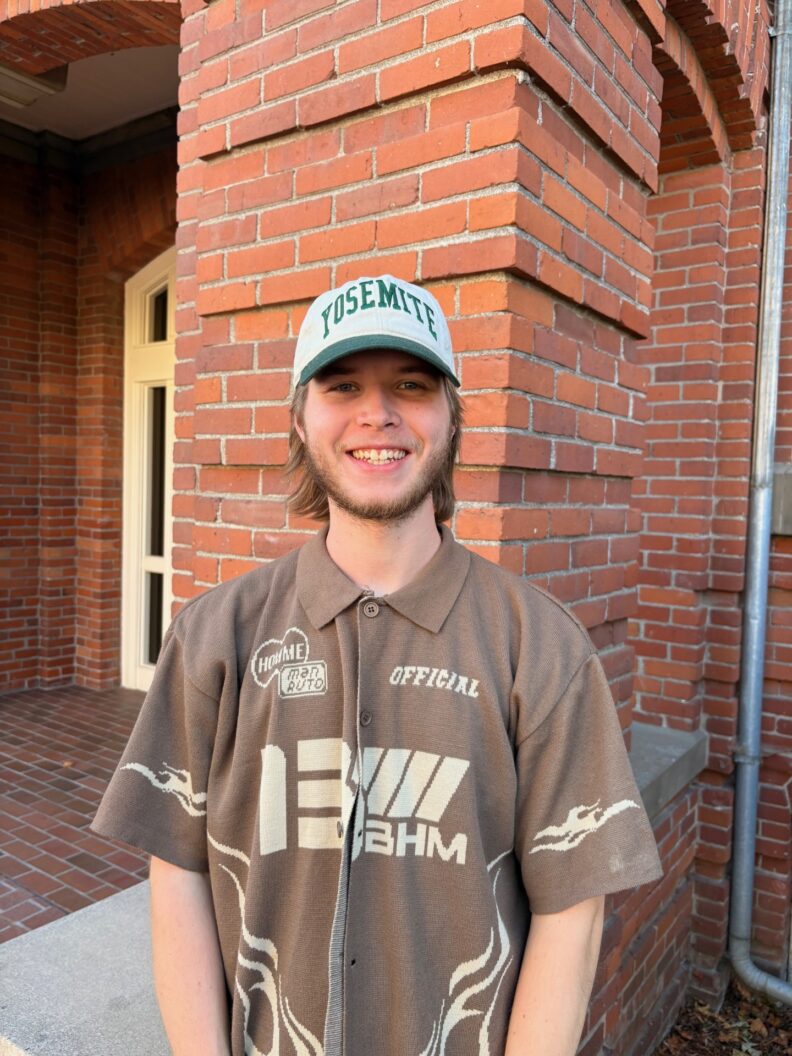 OL Christian smiles in a Yosemite hat