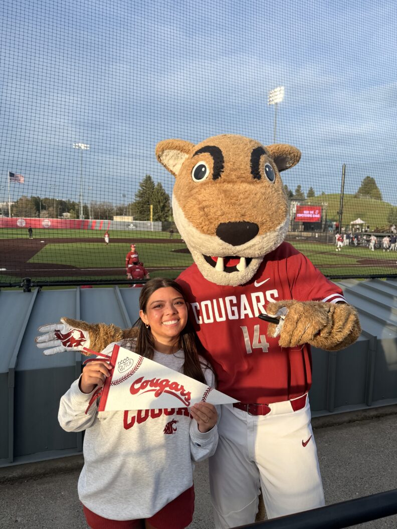 OL Sarah smiles with Butch T. Cougar.
