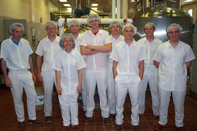 A group photo of creamery workers