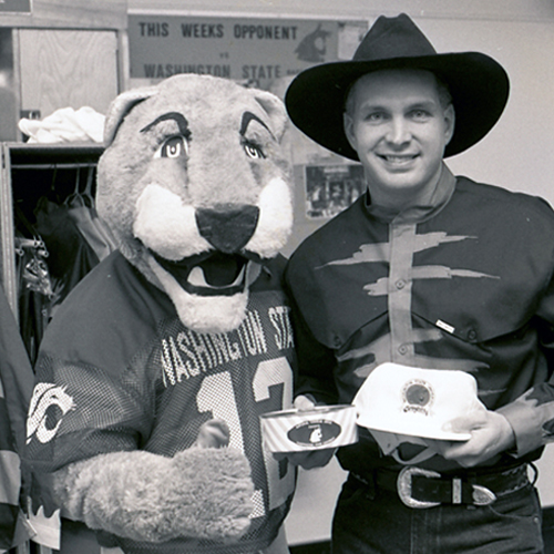 Image of Butch the mascot with Country Music Singer in 1990