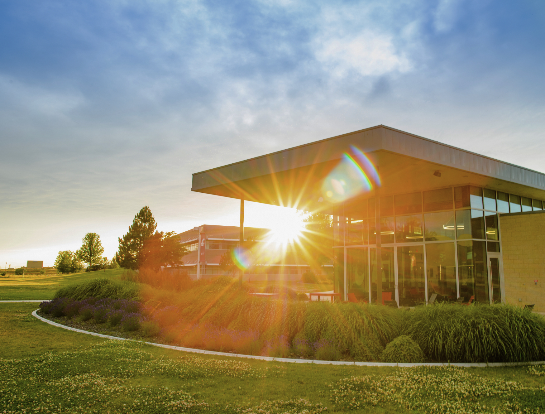 A photo of a building on the WSU Tri-Cities campus as the sun sets