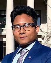 A portrait of Ajay Barman.