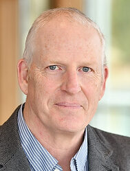 A portrait of Mike Wolcott.