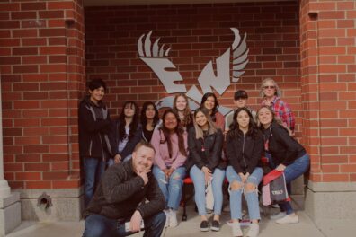 Group picture in front of Eastern Washington University logo on the 2021 EWU campus trip