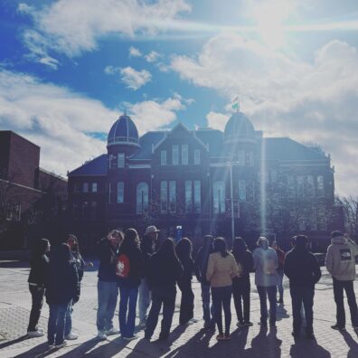 Group photo in front of Barge Hall on 2023 Central Washington University campus trip