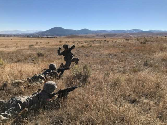 A group of three WSU Army ROTC during training.